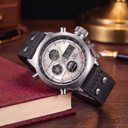 Dual Display Watch with black leather strap, silver case and white dial, analog and digital display, draped over a book stack