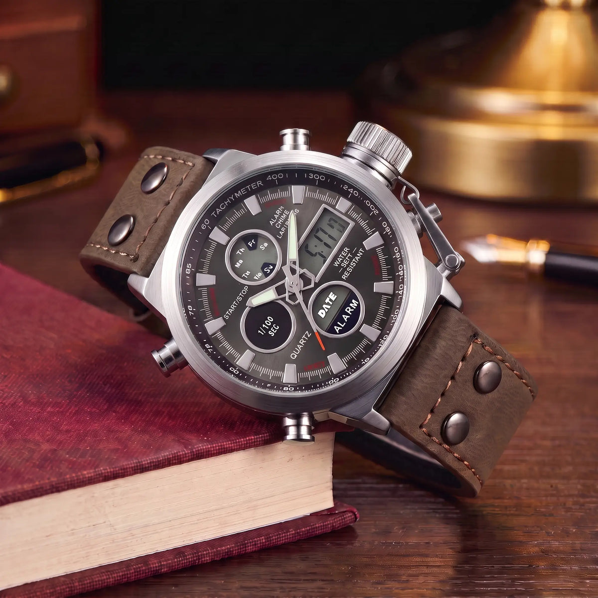 Dual Display Watch with brown leather strap, silver case and black dial, analog and digital display, draped over a book stack