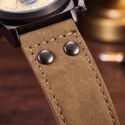 Close up of the khaki leather strap, metal rivets and contrast stitching on the Dual Display Watch