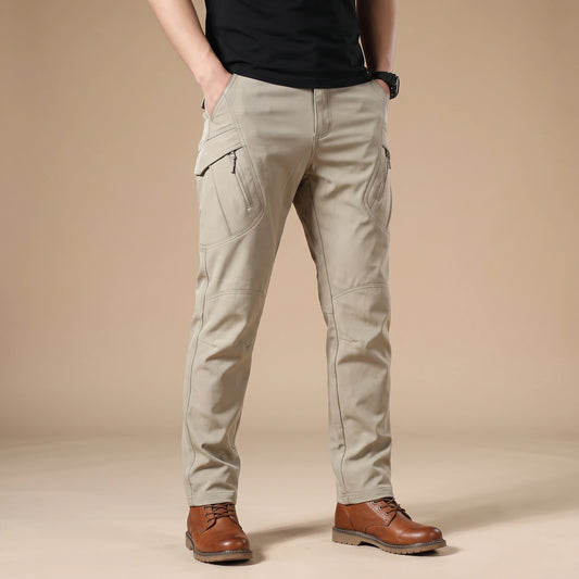 Stretch cargo trousers in khaki, worn front view in a warm studio