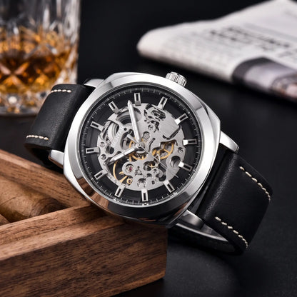 Exposed Gear Watch with silver case, black skeleton dial and black leather strap