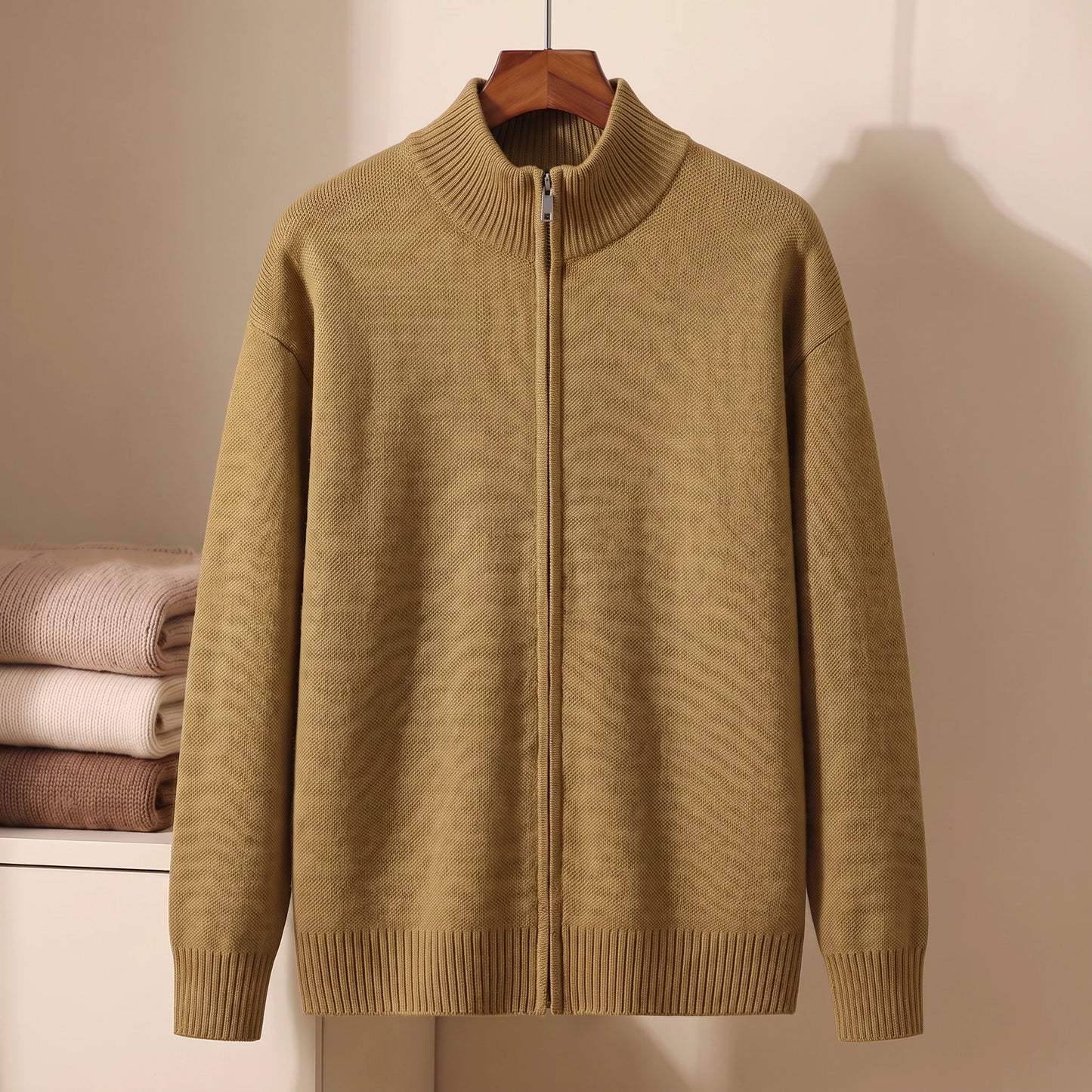 Yellow full-zip stand-collar knit sweater on hanger