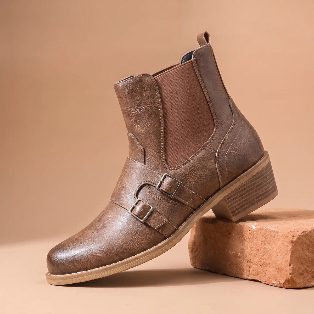 Grained Finish Boots in brown, a western style slip-on ankle boot with two buckle straps and a stacked heel
