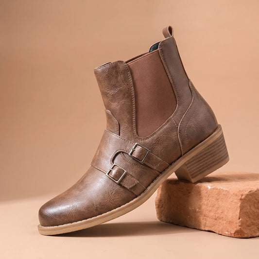 Grained Finish Boots in brown, a western style slip-on ankle boot with two buckle straps and a stacked heel
