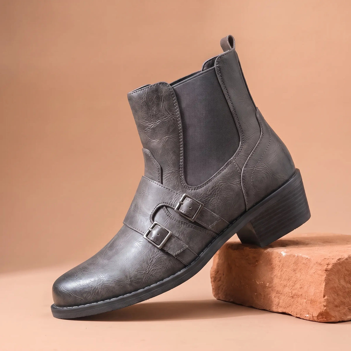 Grained Finish Boots in grey, a western style slip-on ankle boot with two buckle straps and a stacked heel