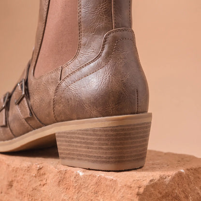 Close up of the stitched heel counter and stacked block heel on the Grained Finish Boots