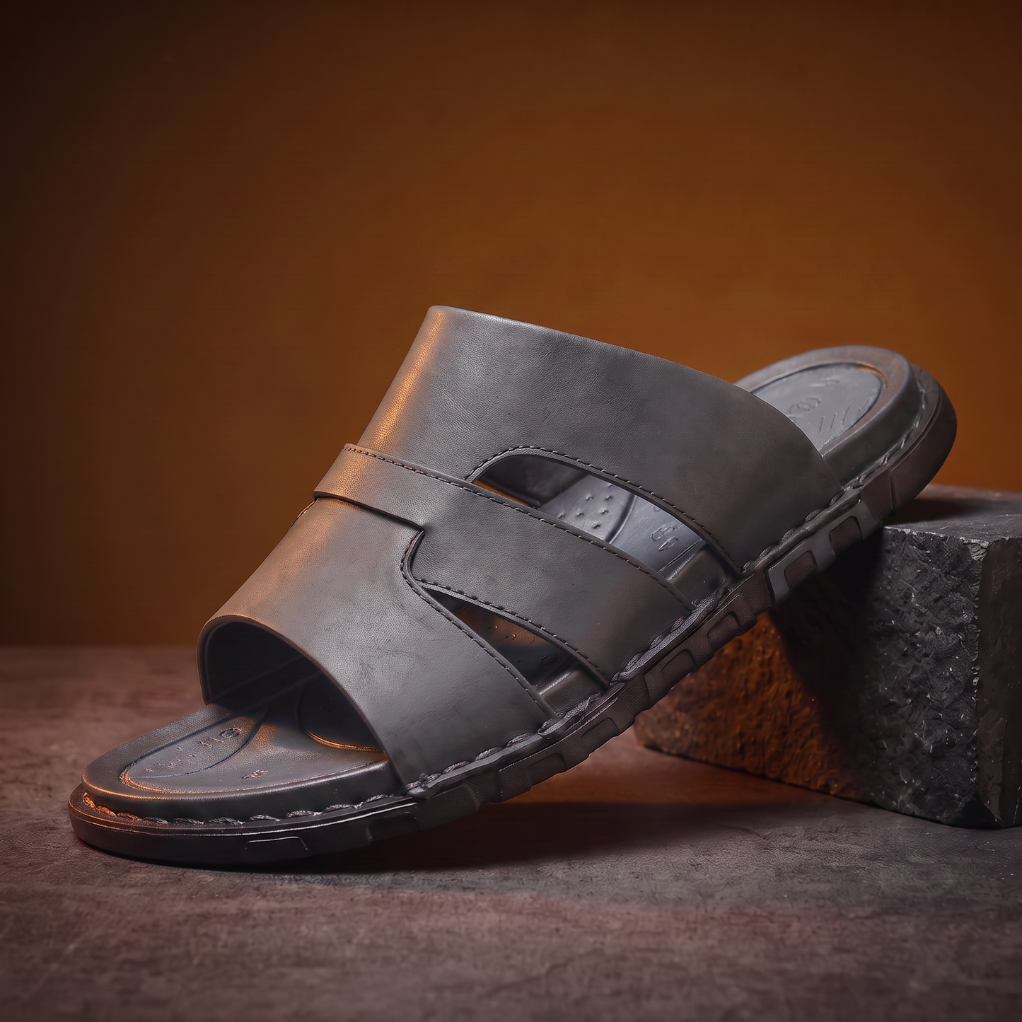Woven Leather Slides in grey - men's backless leather slide with woven cross-strap, cushioned footbed and chunky sole