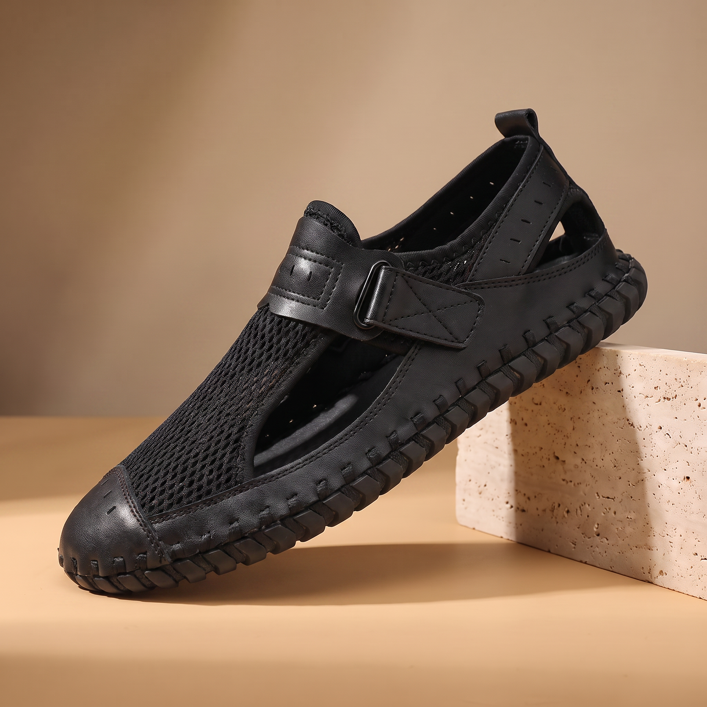 Woven Mesh Sandals in black - men's breathable mesh slip-on shoe with velcro cross-strap and dark rubber sole