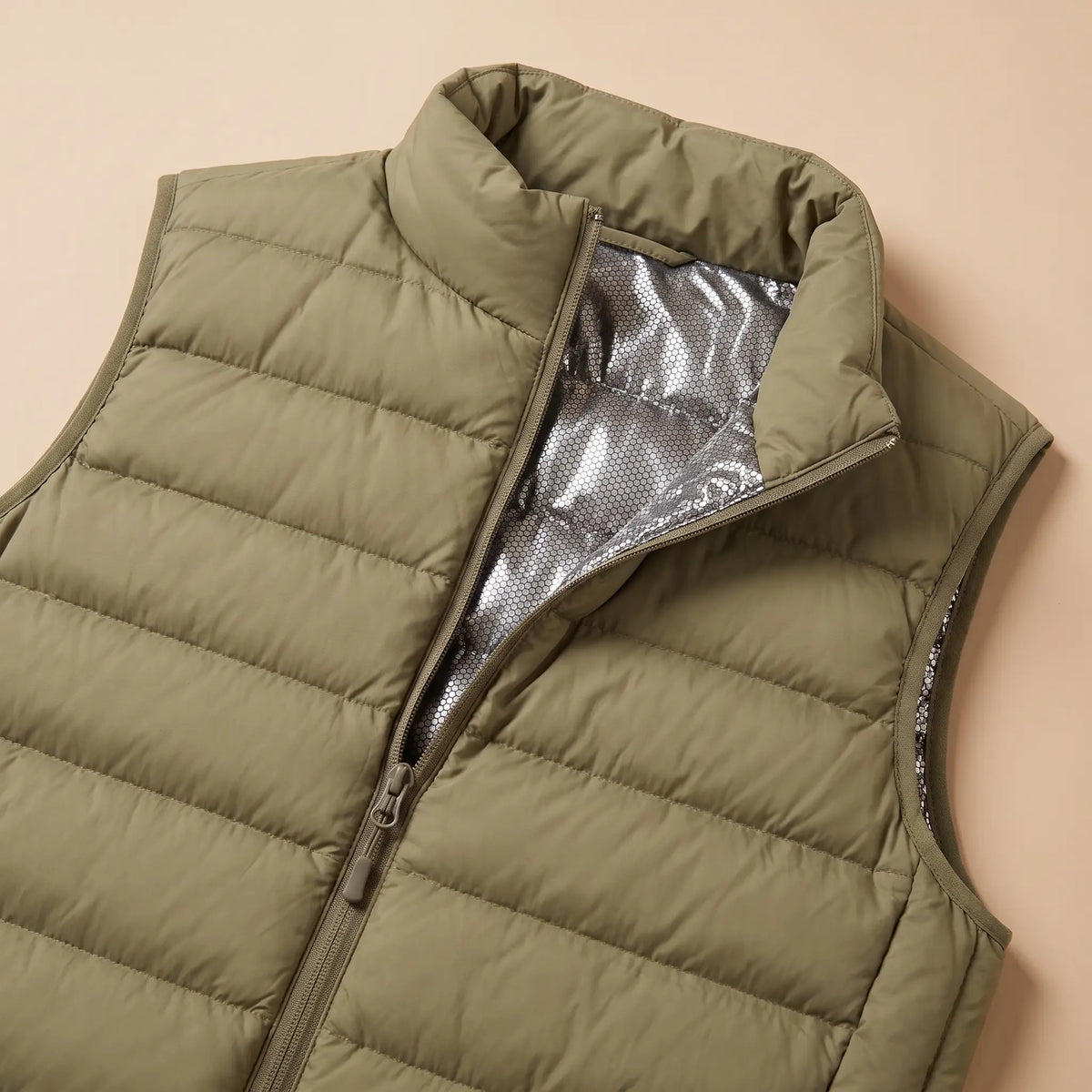 PACKABLE DOWN VEST silver lining and collar detail
