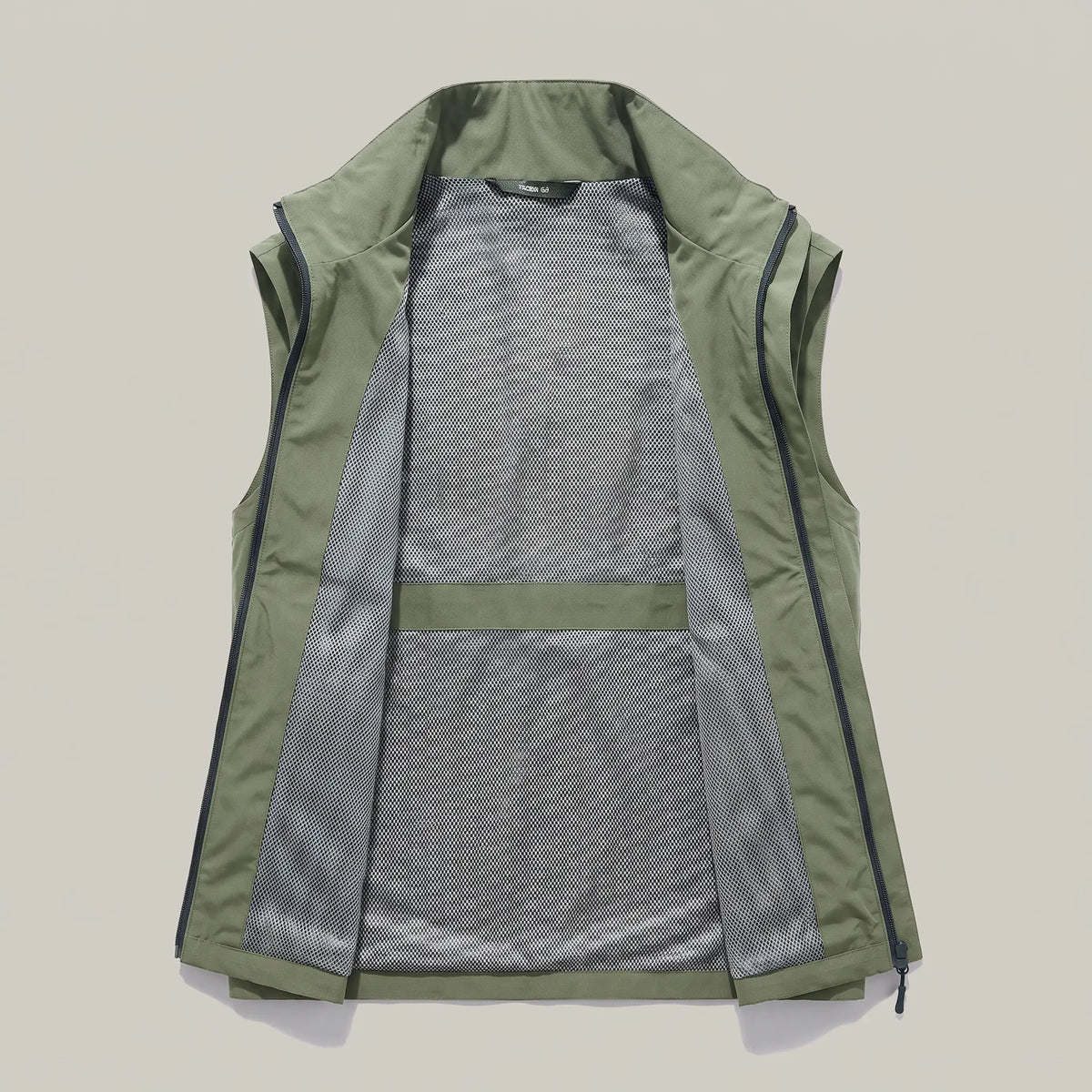 MESH LINED VEST Army Green laid flat showing the grey open mesh lining
