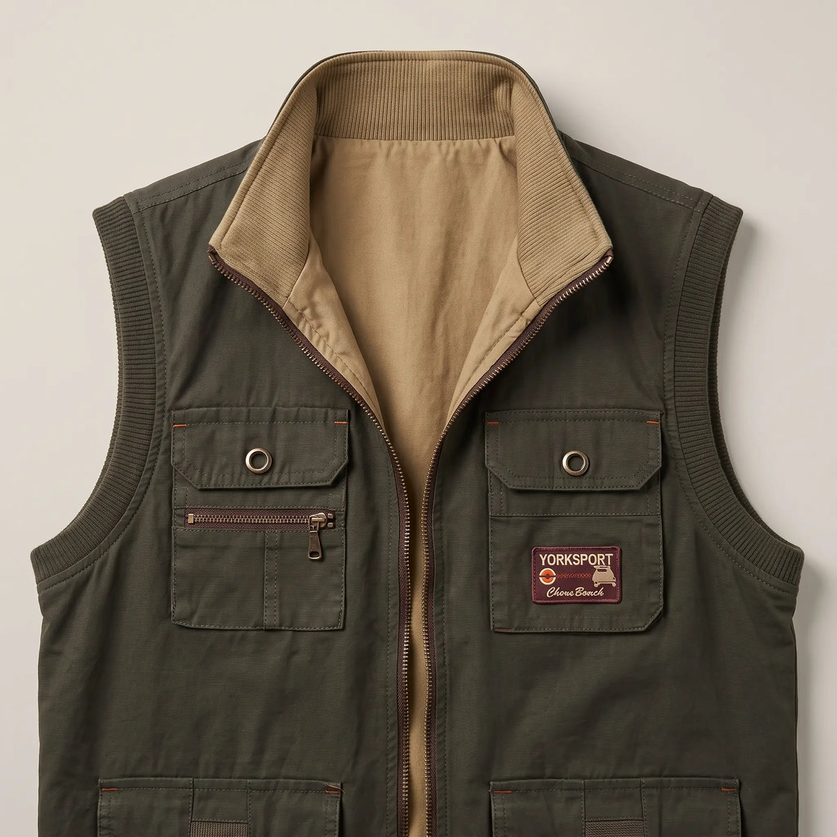 REVERSIBLE CARGO VEST Green upper chest pockets with ring snaps and zip, khaki reverse face