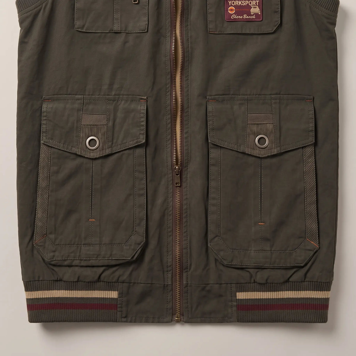 REVERSIBLE CARGO VEST Green cargo pockets with ribbed snap flaps and striped ribbed hem