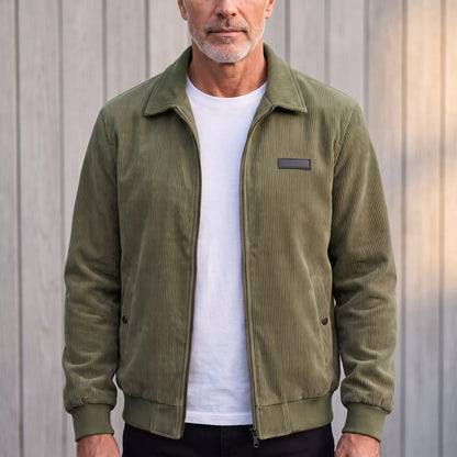 Green corduroy Harrington jacket worn open over a white tee, front view