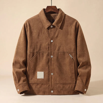 Khaki padded corduroy winter jacket with snap front on a wooden hanger, front view