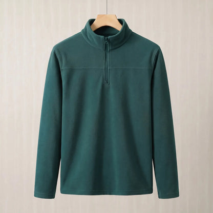 Wood green brushed fleece half zip pullover on a wooden hanger, front view