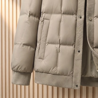 Close up of the ribbed knit hem, front pocket and cuff