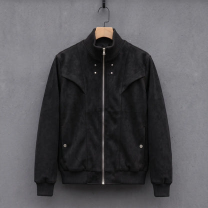 Black suede bomber jacket with ribbed stand collar on a wooden hanger, front view