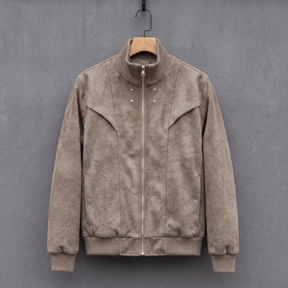 Light grey suede bomber jacket with ribbed stand collar on a wooden hanger, front view