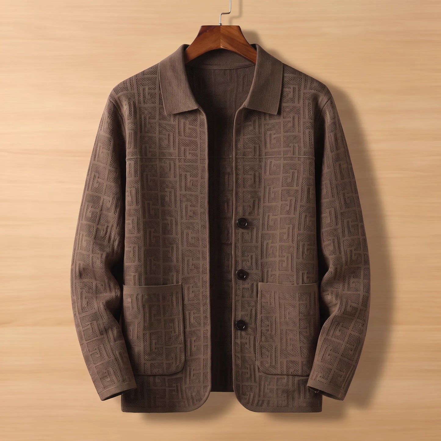Brown jacquard knit cardigan on wooden hanger