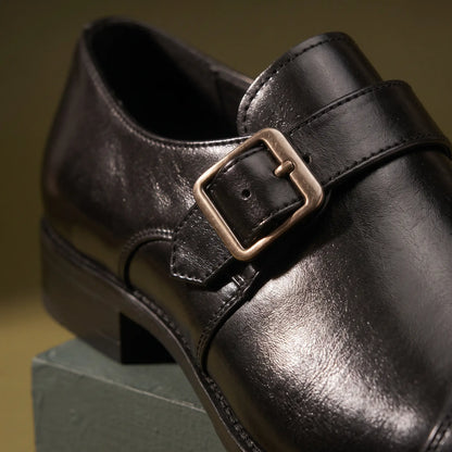 Close up of the monk strap and metal buckle on the Monk Gloss Finish Shoes