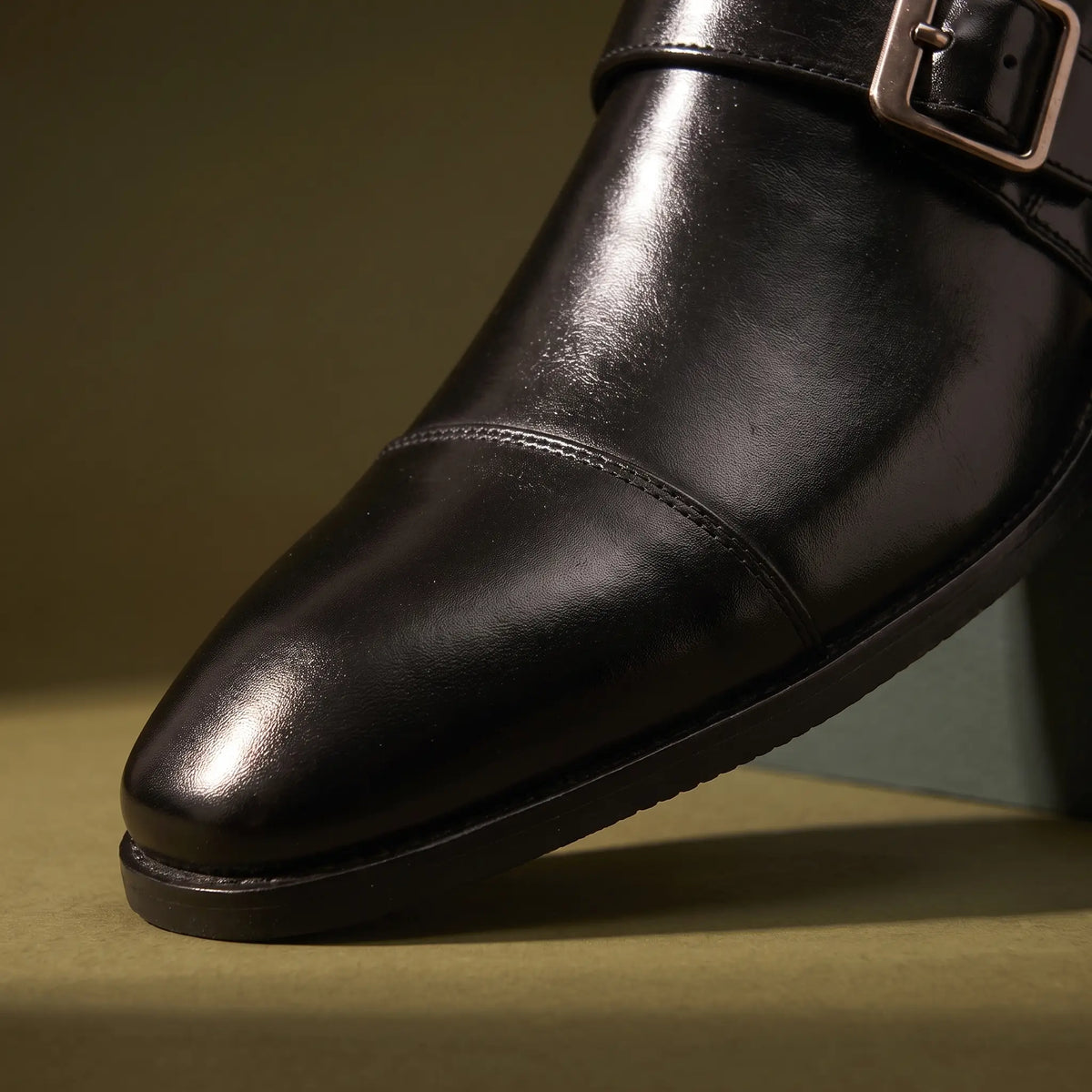 Close up of the toe cap seam and slim sole welt on the Monk Gloss Finish Shoes
