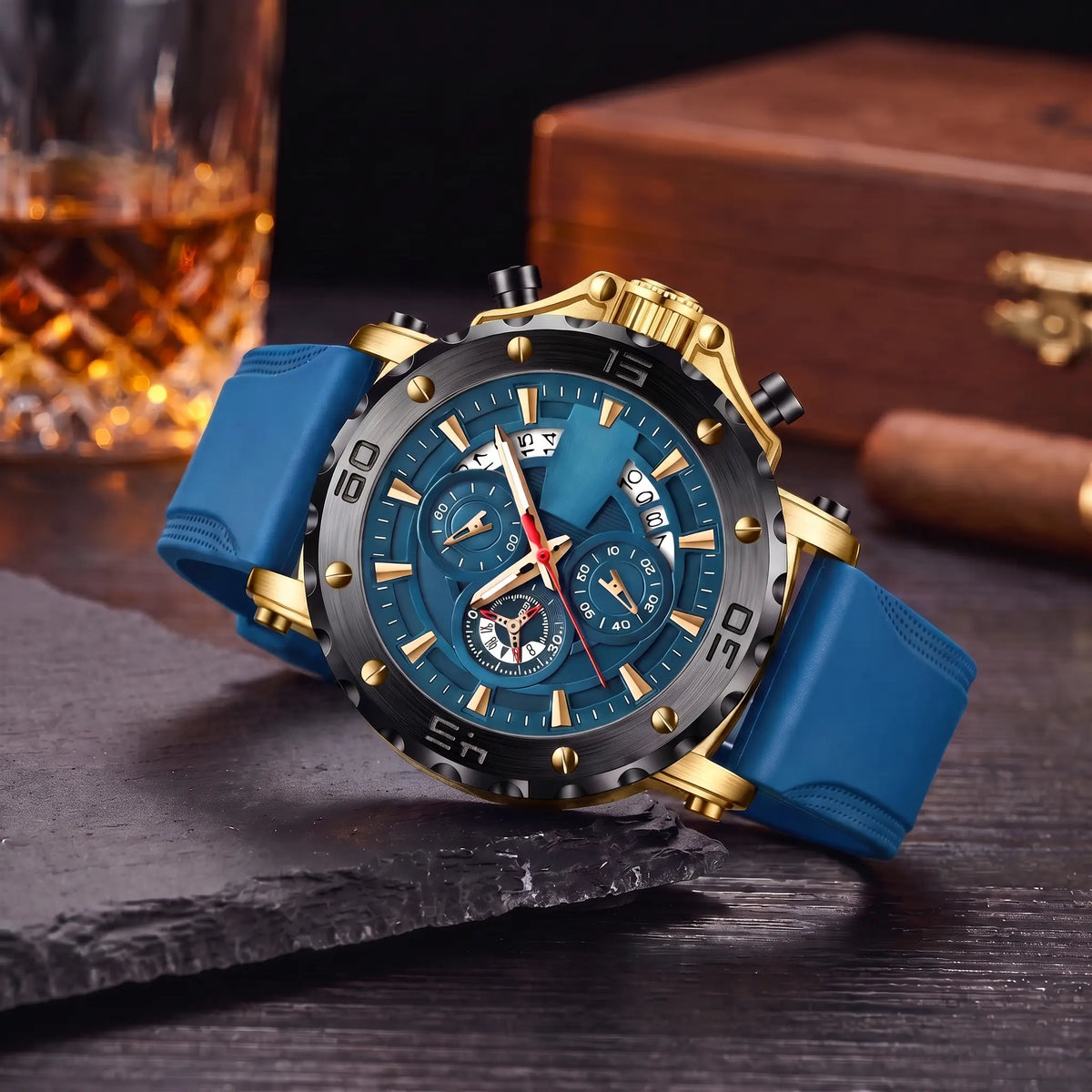 Notched Bezel Watch with gold case, blue dial and blue rubber strap