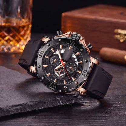 Notched Bezel Watch with rose gold case, black bezel and dial and black rubber strap