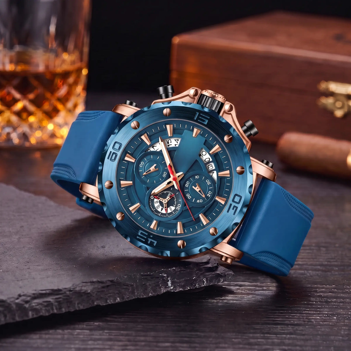 Notched Bezel Watch with rose gold case, blue dial and blue rubber strap