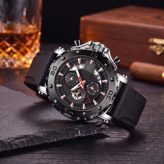 Notched Bezel Watch with steel case, black bezel and dial and black rubber strap