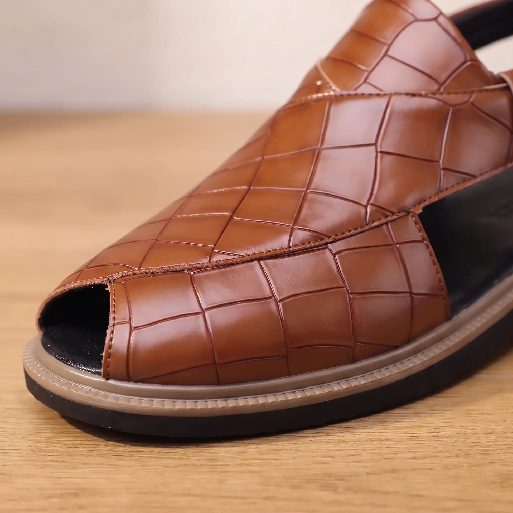 Close up of the peep toe and croc embossed square scales on the brown Open Back Sandals