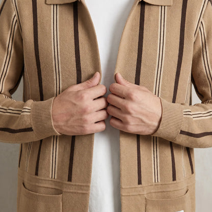 Man drawing the khaki Open Front Cardigan closed over a white tee