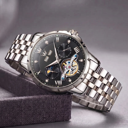 Open Heart Watch with silver steel case, black dial, moon phase and exposed gear window, on a steel band