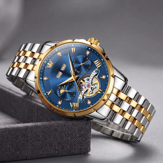 Open Heart Watch with gold bezel, blue dial, moon phase and exposed gear window, on a two tone steel band