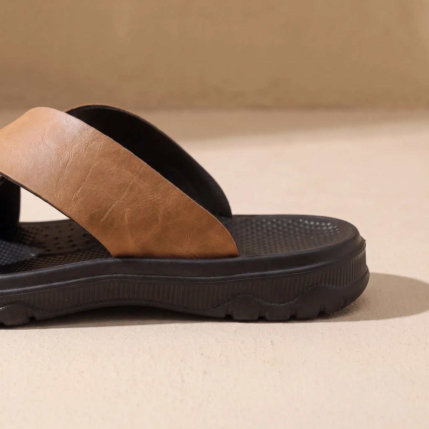 Cross-strap slide heel and sole detail