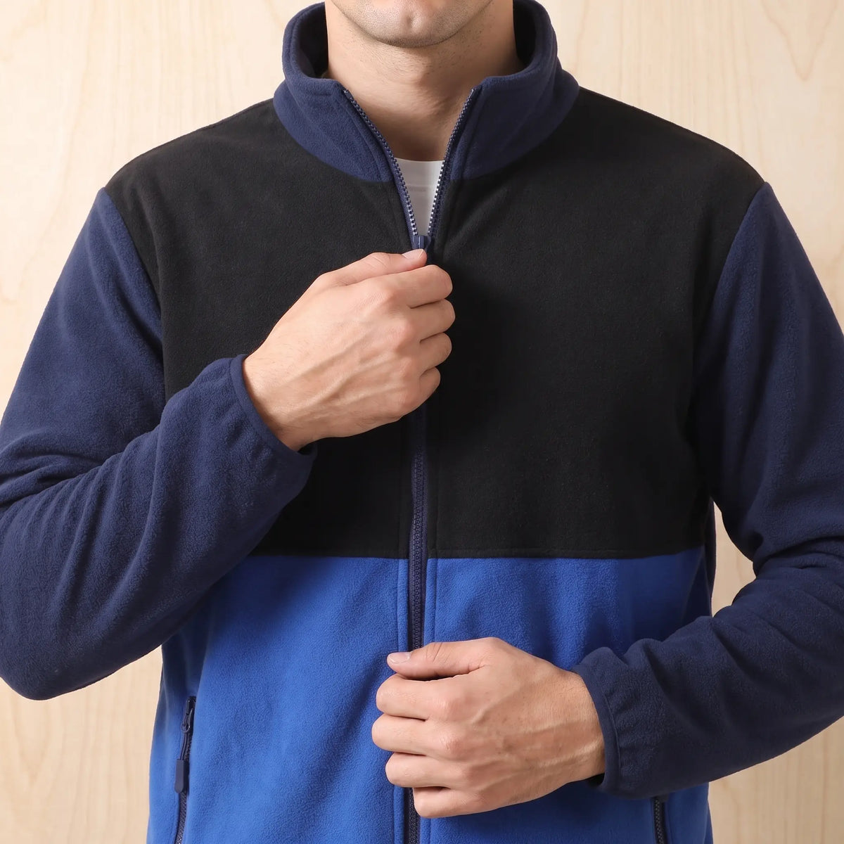 Panelled fleece jacket worn, zipping up