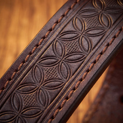 Macro close up of the embossed diamond pattern and edge stitching on the Pressed Pattern Belt