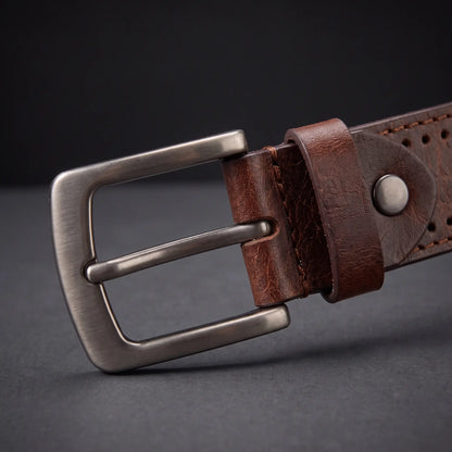 Close up of the gunmetal buckle, keeper loop and metal rivet stud on the Punched Hole Belt