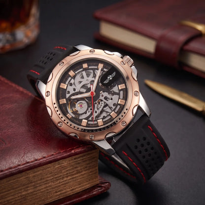 Race Day Watch in rose and black, a skeleton automatic men's watch with an open gear dial and a vented red stitched strap