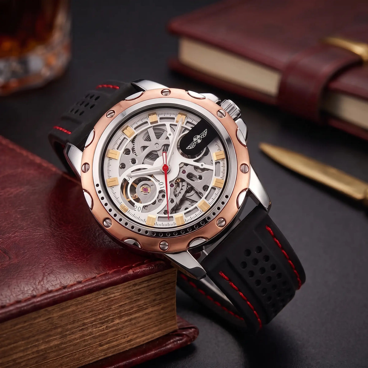 Race Day Watch in rose and white, a skeleton automatic men's watch with an open gear dial and a vented red stitched strap