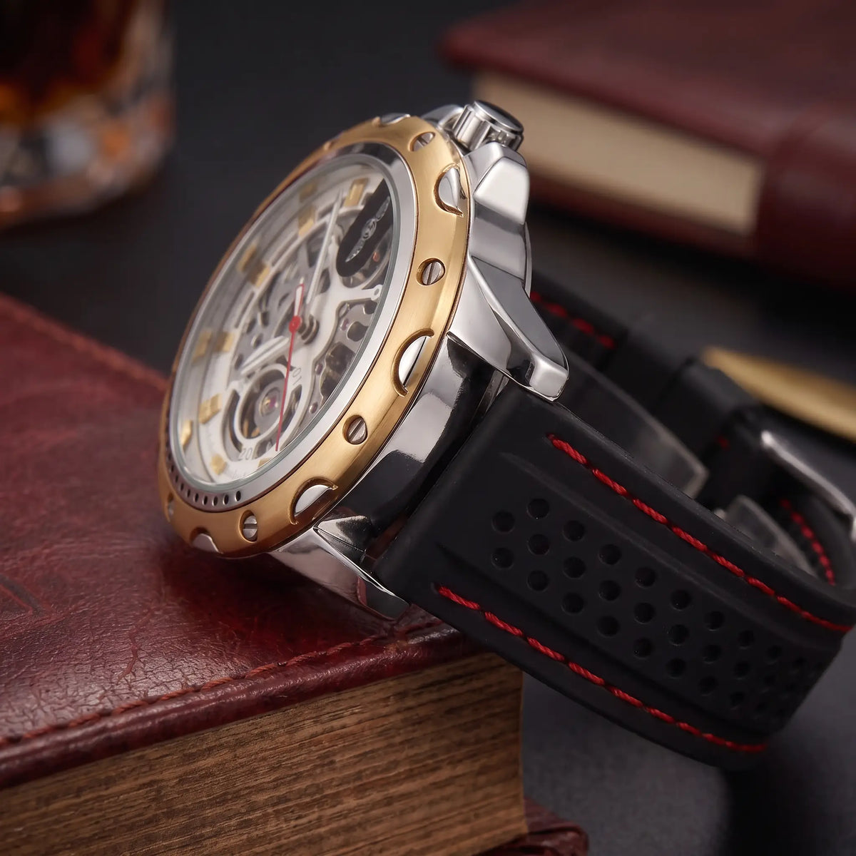 Close up of the crown, case side and vented red stitched strap on the Race Day Watch