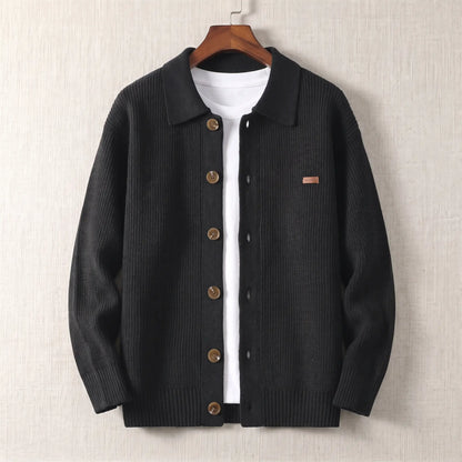 Rib Texture Jacket in black, a ribbed knit button front cardigan jacket with a turn down collar on a wooden hanger