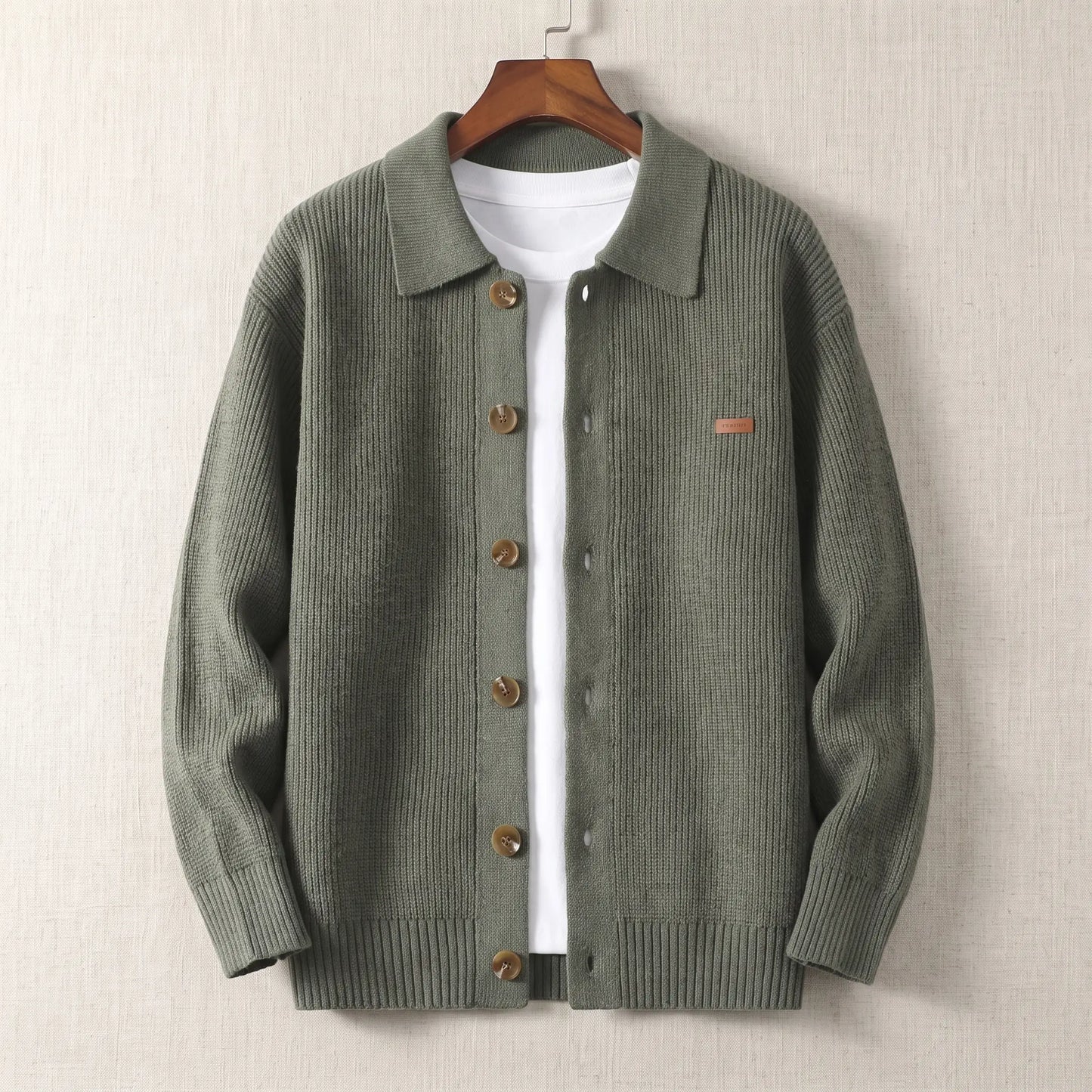 Rib Texture Jacket in green, a ribbed knit button front cardigan jacket with a turn down collar on a wooden hanger