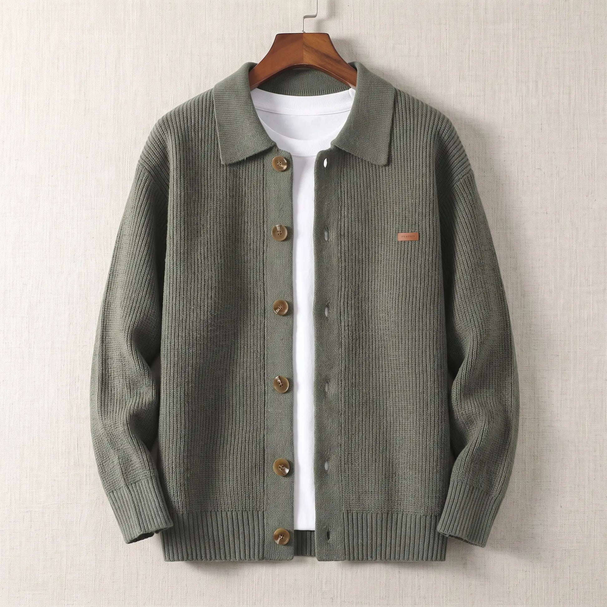 Rib Texture Jacket in green, a ribbed knit button front cardigan jacket with a turn down collar on a wooden hanger