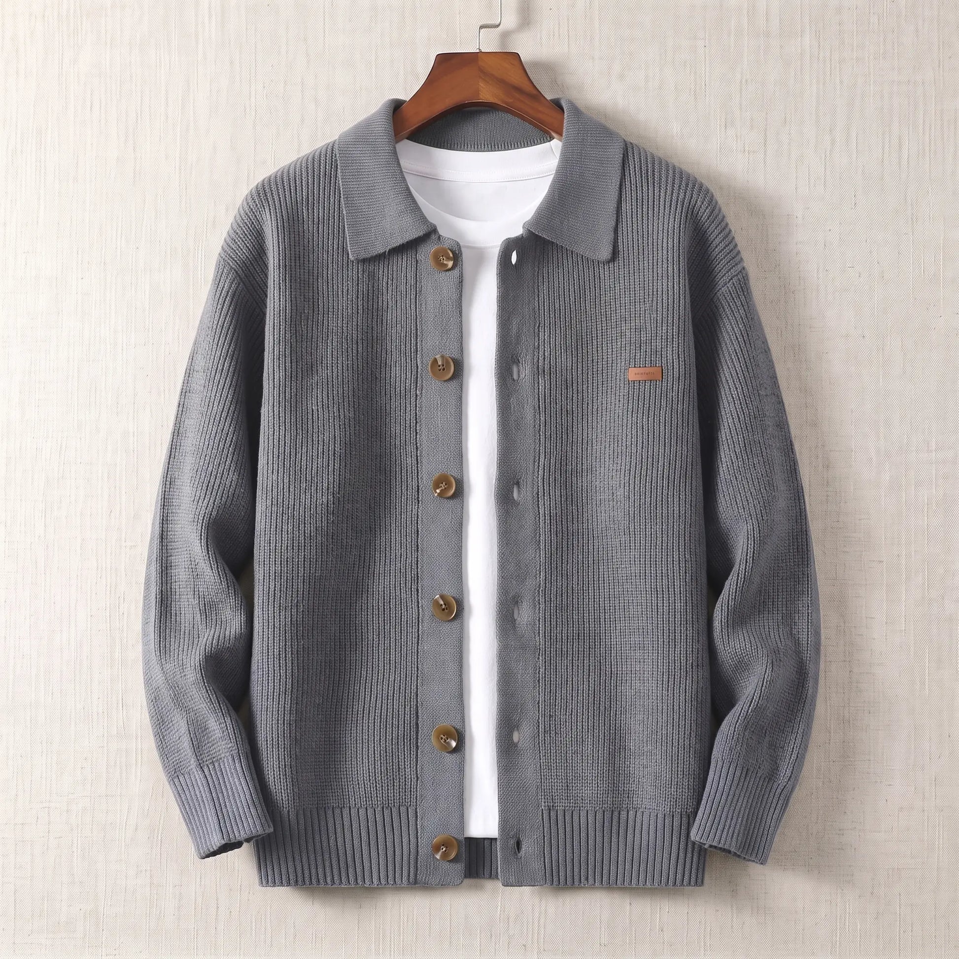 Rib Texture Jacket in grey, a ribbed knit button front cardigan jacket with a turn down collar on a wooden hanger