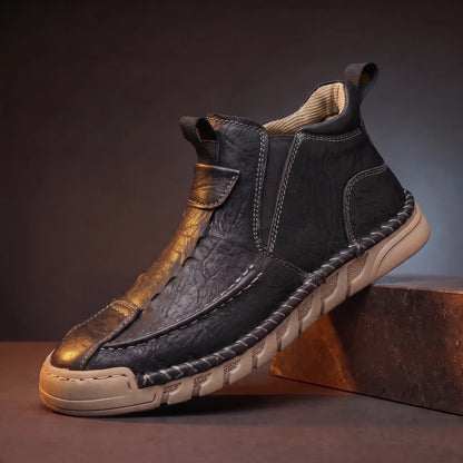 Saddle Seam Boots in black, a hand stitched slip-on leather ankle boot with a gum sole