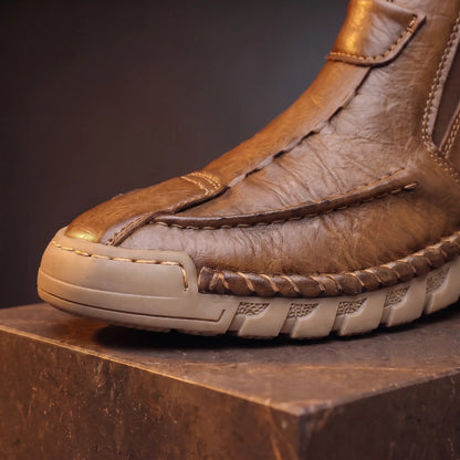 Close up of the toe, welt stitching and scalloped gum sole on the Saddle Seam Boots