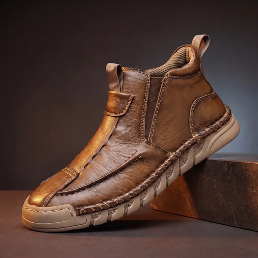 Saddle Seam Boots in tan, a hand stitched slip-on leather ankle boot with a gum sole