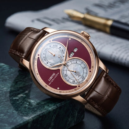 Rose gold case red split dial automatic watch on a brown leather strap