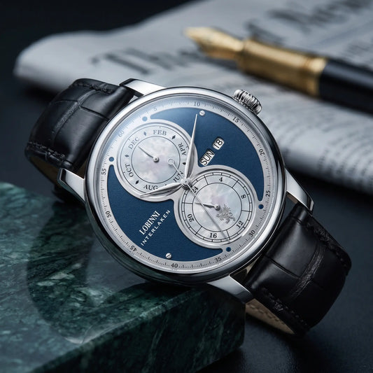 Silver case blue split dial automatic watch on a black leather strap