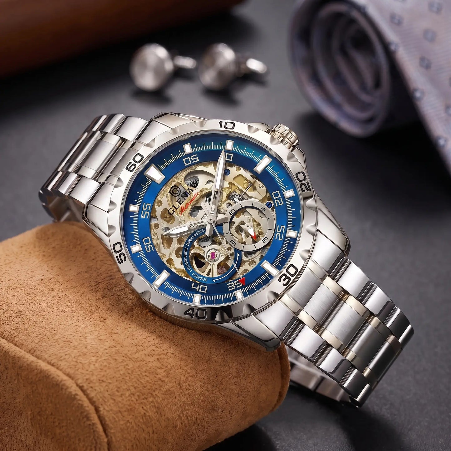 Self Winding Watch in silver steel with a blue bezel ring
